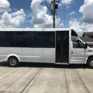 24 passenger white shuttle bus in louisiana